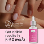 Pink Beauty 96% Snail Mucin Serum dropper bottle shown next to a hand with manicured nails, with text reading 'Cruelty free' and 'Get visible results in just 2 weeks'.