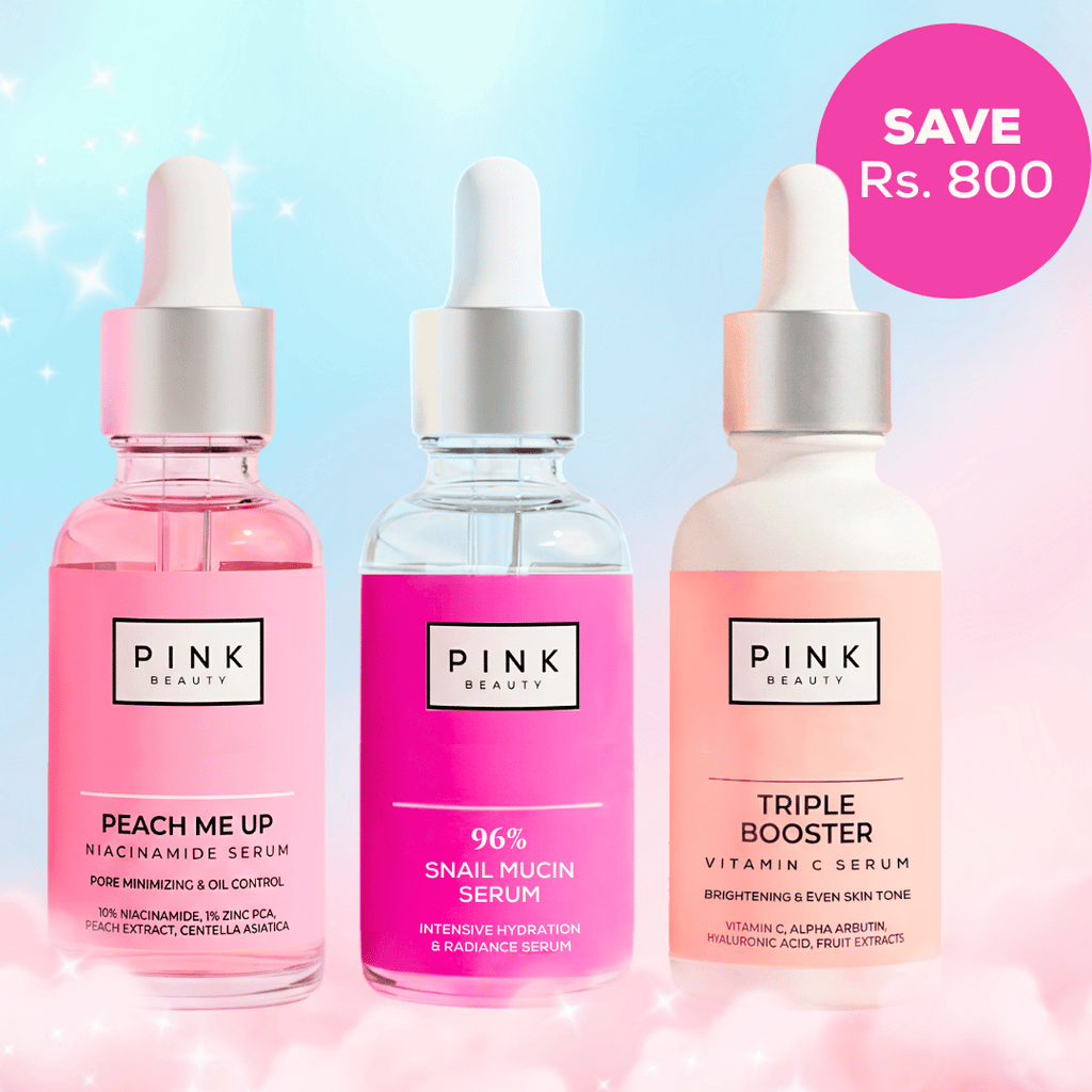 Three Pink Beauty skincare serum bottles in pink and peach tones with droppers, shown against a pastel blue and pink background with a pink 'SAVE Rs. 800' badge.